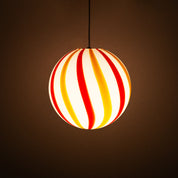 Candy Murano glass sphere pendant lamp "Una Festa!" red and yellow soft swirl D30