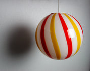 Candy Murano glass sphere pendant lamp "Una Festa!" red and yellow soft swirl D30